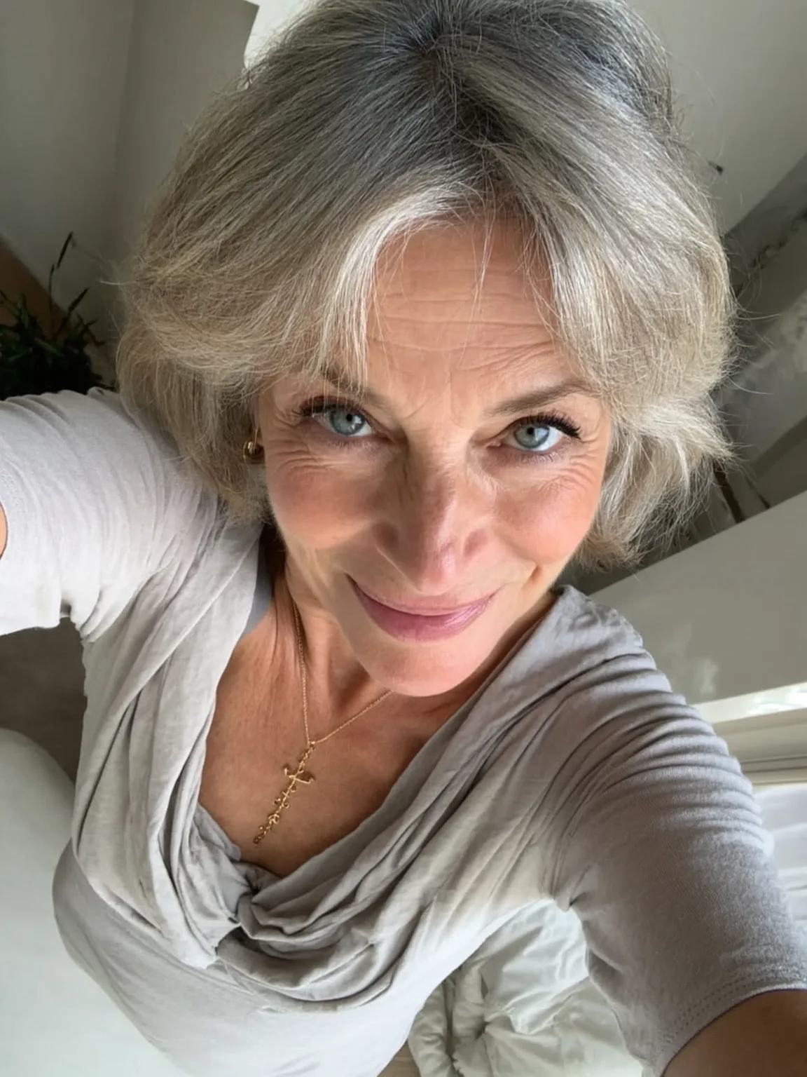 Wavy Layered Silver Frost Bob with Curtain Bangs